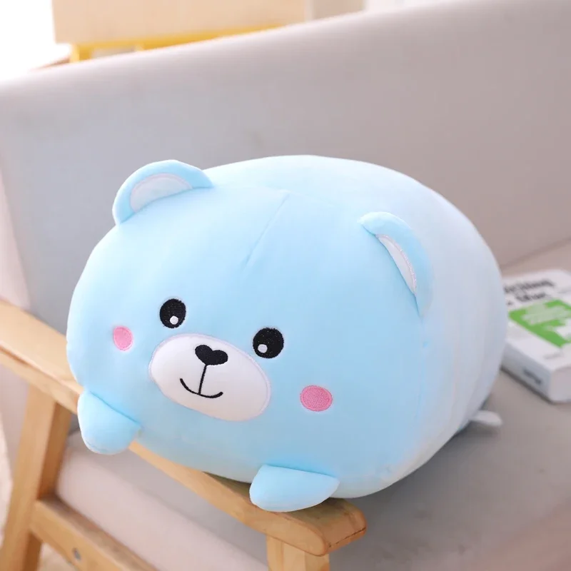 ours en peluche bleu assis
